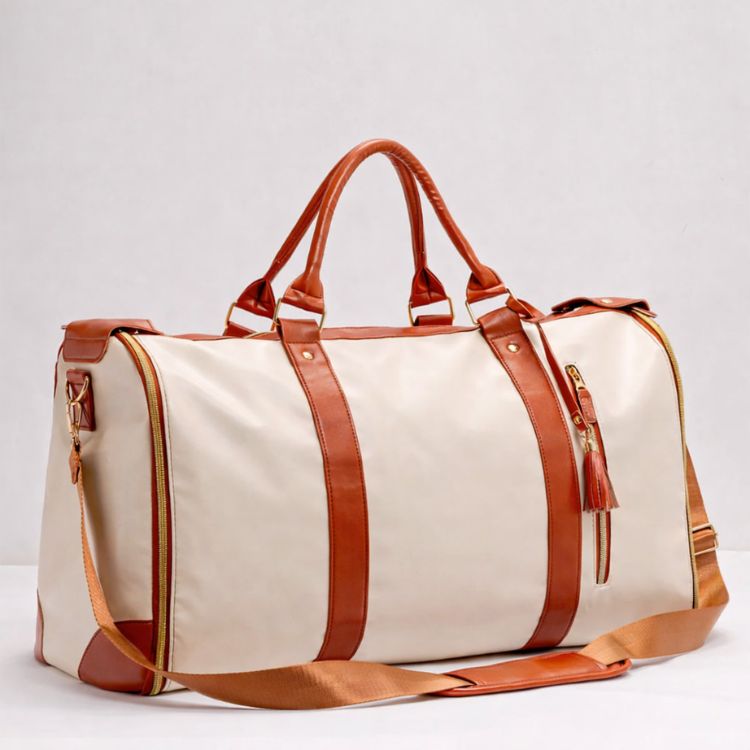 Sac de voyage Escalette coloris beige avec anses et bandoulière cognac