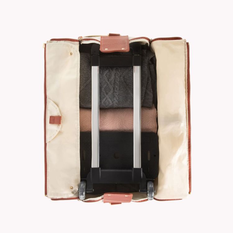 Intérieur du sac avec le châssis à roulettes et la poignée télescopique