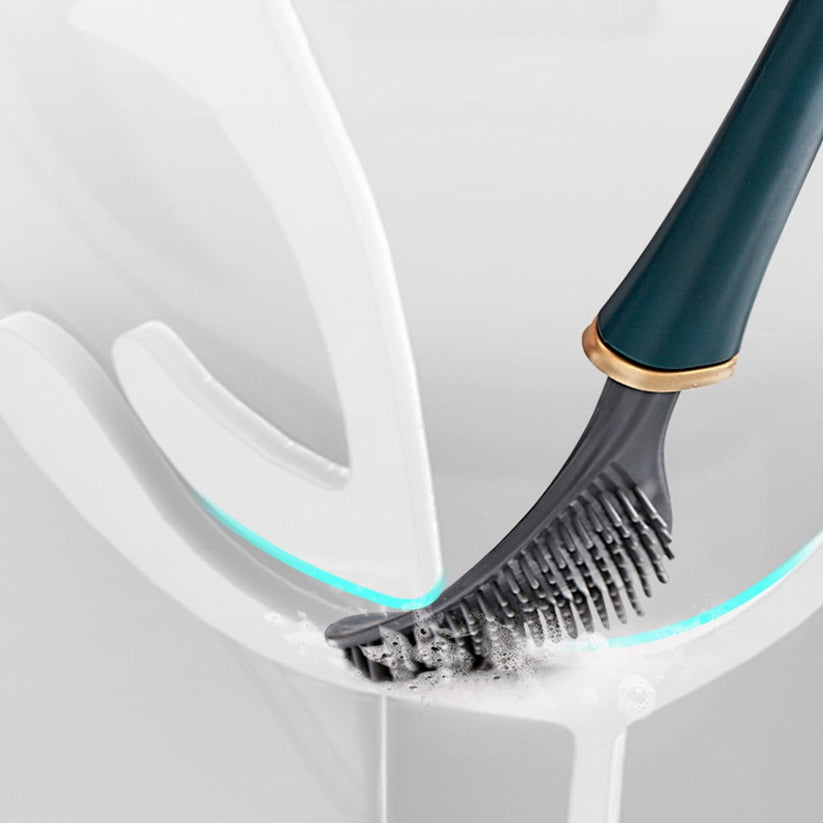 Tête en silicone qui se plie pour nettoyer sous le rebord de la cuvette