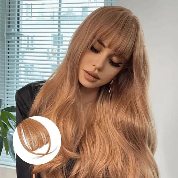 Frange à clipser sur cheveux caramel ondulés